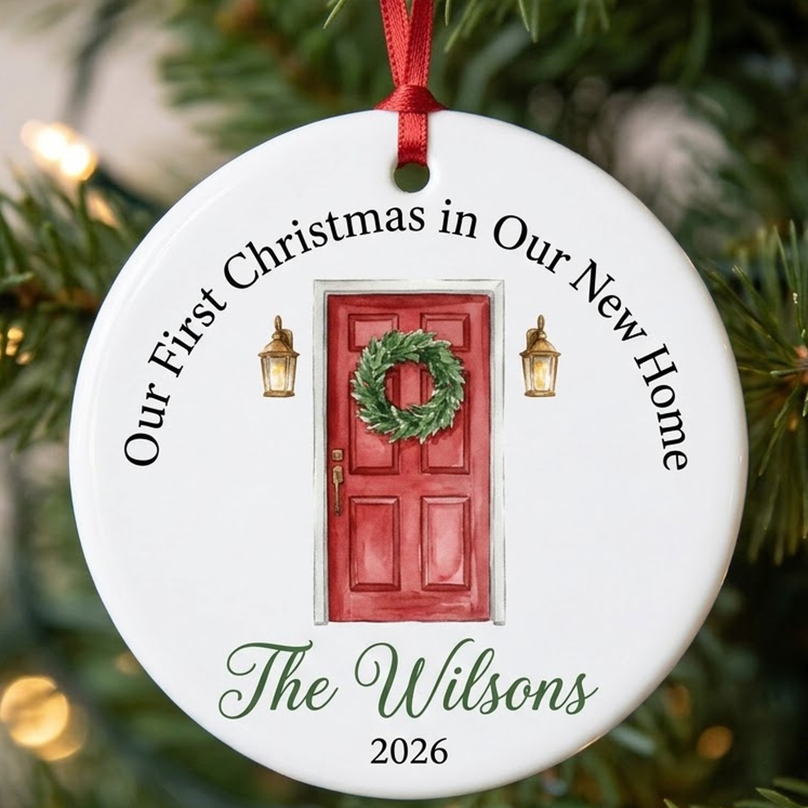 New home ornament in white ceramic with front door with wreath